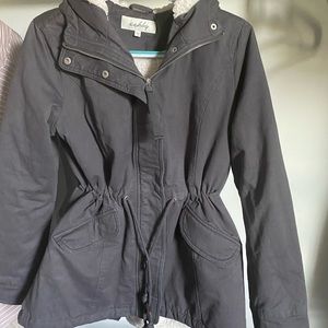 Coat, lined, zipper and buttons with hood.